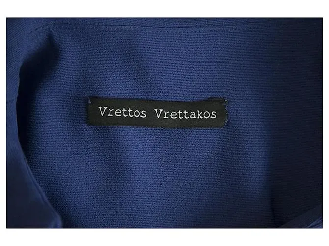 Autre Marque Vrettos Vrettakos Vestido azul de capa sin mangas hasta la rodilla 