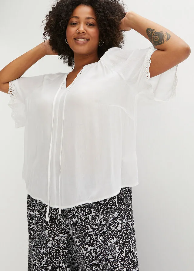 Blusa con encaje de viscosa sostenible Negro