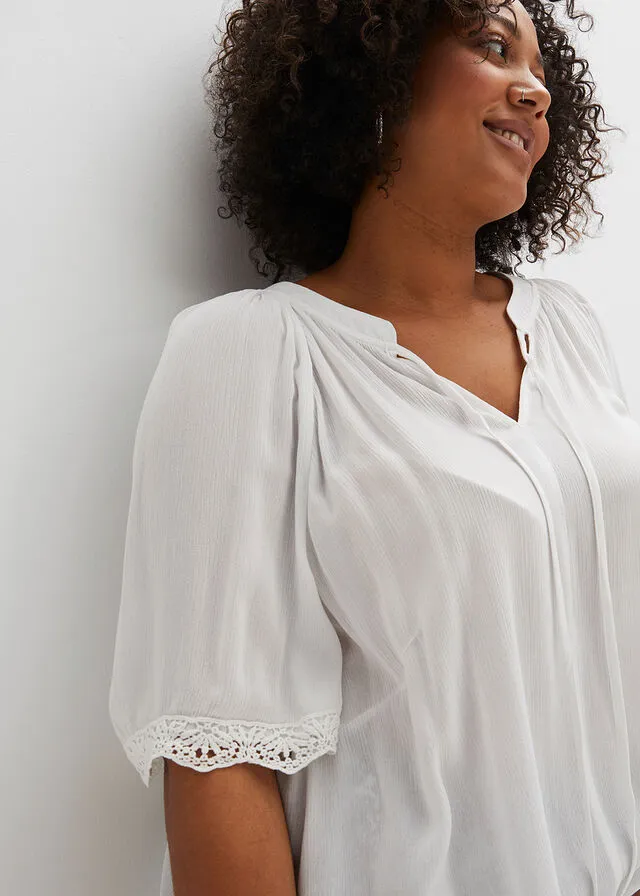 Blusa con encaje de viscosa sostenible Negro