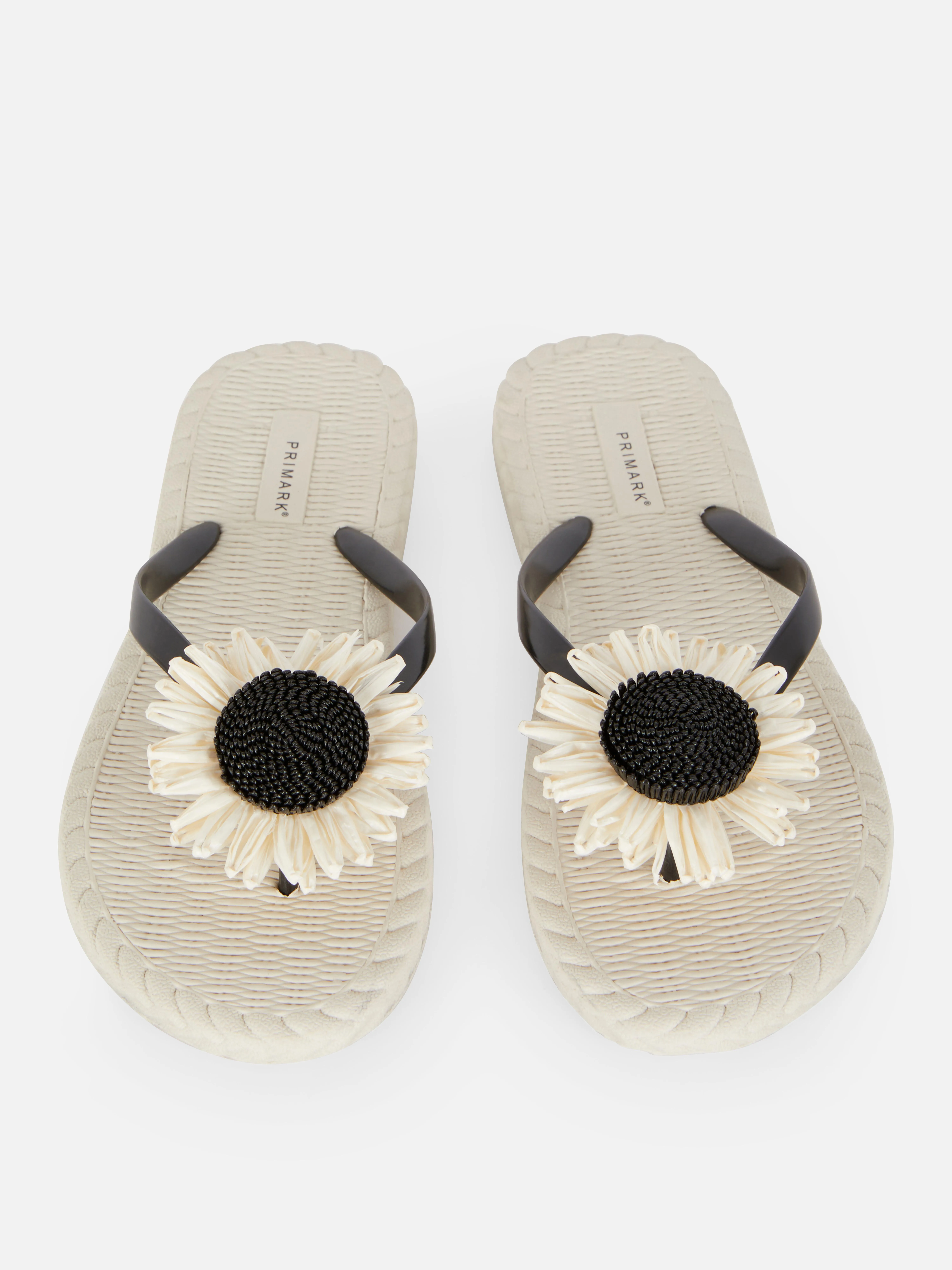 Chanclas con girasol tejido